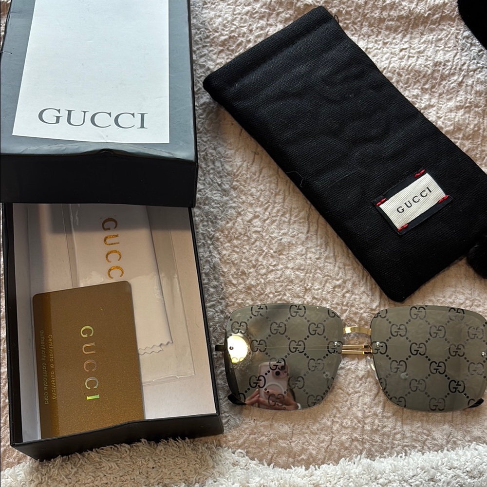 Gucci Black and Gold Sunglasses
